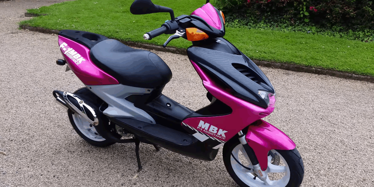 mbk-nitro-f1-assistance-rose-carbone-1998-origine